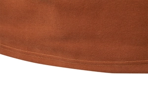 Detailed close-up of brown knit polo sweatshirt hem with durable double-needle stitching