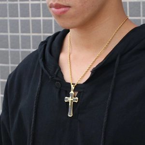 Men's gold stainless steel cross pendant necklace with black inlay on a twisted rope chain
