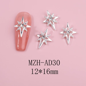 Macro view of 12x16mm silver star nail art charms with sparkling white zircons