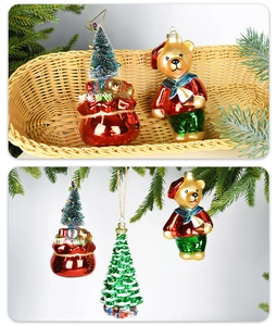Detailed view of glass Christmas ornaments including a bear and tree in a wicker basket