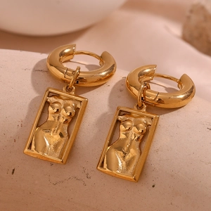 Detailed relief of female torso on 18K gold plated stainless steel rectangular earring