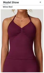 Detailed view of wine red seamless yoga vest with flattering gathered chest design