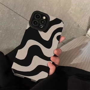 Minimalist black and white wavy zebra stripe iPhone case with non-slip texture