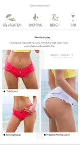 Dettagli di micro shorts in denim a vita bassa elasticizzati con bordi sfrangiati rossi e bianchi