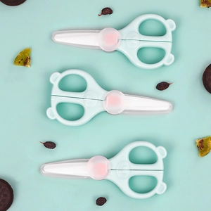 Portable baby food scissors with safety cover, cute bear ear handles, stainless steel kitchen tool.
