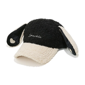 Detail of furry lamb wool baseball cap with cute long rabbit ears and heart patch