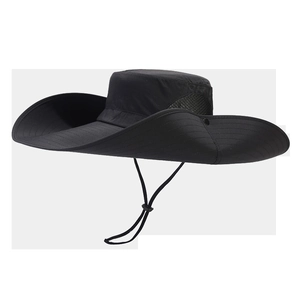Detail of wide brim sun hat featuring side mesh vents and adjustable chin strap