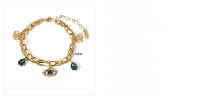 Macro detail of gold-plated evil eye bracelet with blue drop stone and steel dimensions