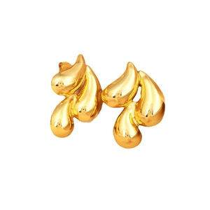 Polished 18K gold flame earrings with abstract liquid design and mirrored finish