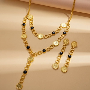 Golden Y-shaped sweater necklace and drop earrings set with black enamel round pendant details