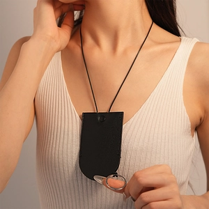 Minimalist black leather key holder necklace with adjustable strap and metal ring