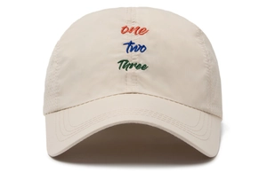 Close-up of three-color letter embroidery and breathable mesh on quick-dry baseball cap