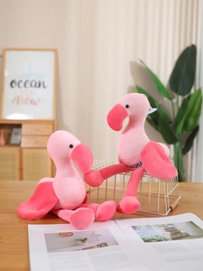 Detail of soft pink flamingo plush toys with DEGNA printing and suction cup hanger