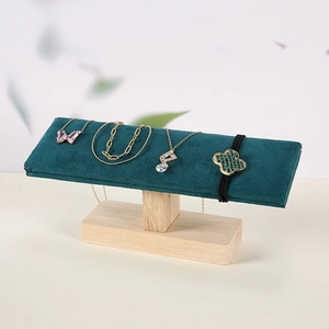 Green velvet T-bar jewelry display stand with solid rubber wood base for bracelets