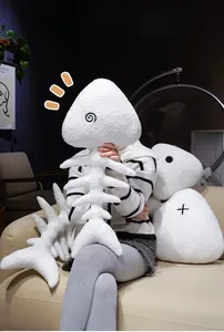 Detailed view of the soft white fishbone plush pillow featuring cozy sherpa fleece fabric