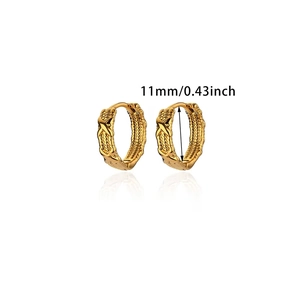 Detail view of 11mm gold hoop earrings with woven texture and cross embossed pattern