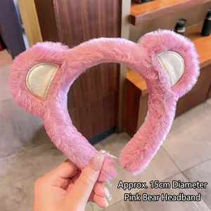 Detail view of pink plush bear ear headband with a 15cm diameter for daily skincare