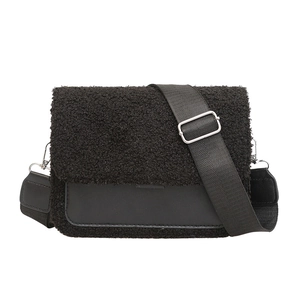 Black faux shearling square crossbody bag with leather patchwork and nylon shoulder strap