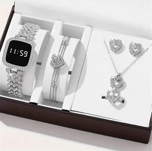 Detail of silver watch and jewelry gift set featuring heart-shaped rhinestones in a gift box