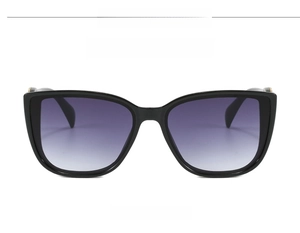 Detail of oversized cat-eye sunglasses with twist temple and gradient purple lenses