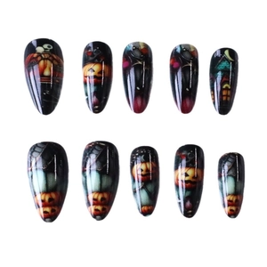 Long almond Halloween press-on nails featuring black base with pumpkin and ghost motifs