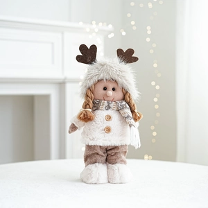 Close-up of plush Christmas dolls with faux fur, brown antlers and knitted scarf detail