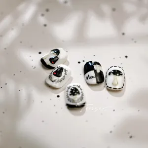 Artistic hand-painted black and white mushroom nail art stickers with heart patterns
