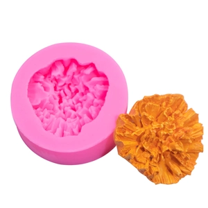 Moule en silicone tournesol rose et décoration florale en pâte à sucre orange finie