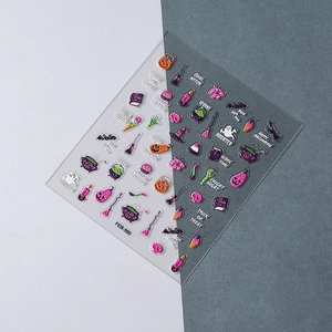 Macro shot of 5D Halloween nail stickers featuring white ghosts and witch hats detail
