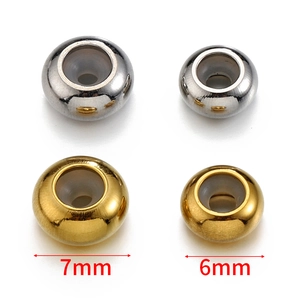 Gold and silver stainless steel slider beads with silicone inserts in 6mm and 7mm sizes