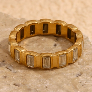 Gold-plated stainless steel eternity ring with rectangular clear zircon stones on stone
