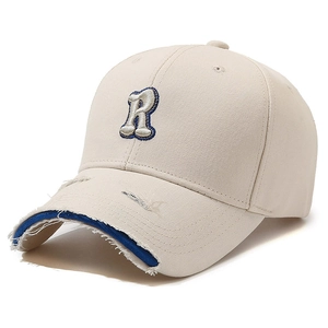 Off-white distressed baseball cap with embroidered letter R and torn brim detail