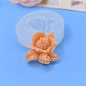 Detailed macro view of leaf and flower silicone mold showing realistic rose texture