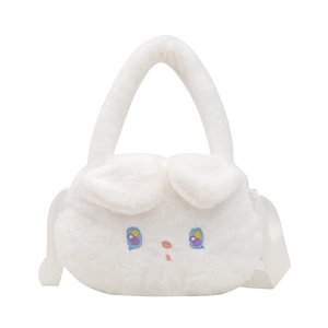 Detail of soft white plush Cinnamoroll bag featuring embroidered face and floppy ears