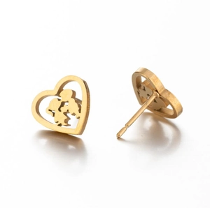 Detailed view of gold heart stud earrings featuring a romantic couple silhouette cutout