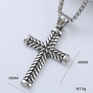 Detailed view of silver cross pendant with vintage texture and dimensions 44MM by 30MM