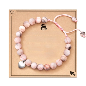 Pink zebra stone heart bracelet on a 19th birthday wish card with heartfelt message