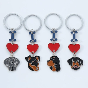 Cute metal dog breed keychains with enamel charms and heart bone accents for bags