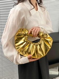 Metallic gold cloud clutch bag with pleated PU leather texture and structured top handle