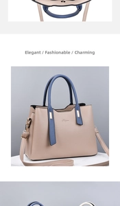 Close-up of beige and blue patchwork textured leather handbag with gold metal hardware