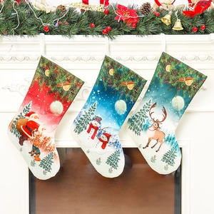 Three-piece Christmas stocking set featuring Santa, snowman, and reindeer on a fireplace