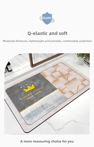 Detail of grey diatom mud bath mat with gold crown motif and soft water-absorbent texture