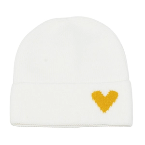 Detail of white knit beanie featuring a small yellow heart embroidery on the folded cuff