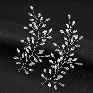 Sparkling crystal bridal hairpins set in silver leaf design for weddings and parties