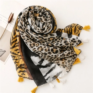 Chic zebra and leopard print scarf with yellow fringe and artistic geometric color blocks