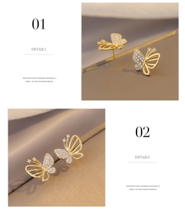 Detail of butterfly earrings featuring gold plating and pavé-set cubic zirconia stones
