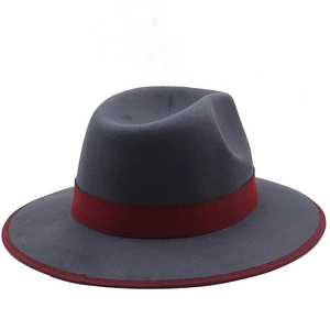 Classic dark grey wool jazz hat with burgundy ribbon and brim detailing in flat lay view