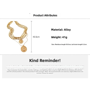Detail view of gold layered coin necklace with portrait pendants and size parameters