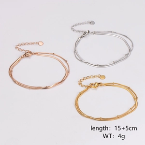 Double-layer bead and snake chain bracelets in rose gold, silver, and gold finishes