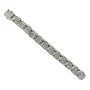 Luxury silver Cuban link bracelet set with sparkling rhinestones on a white background